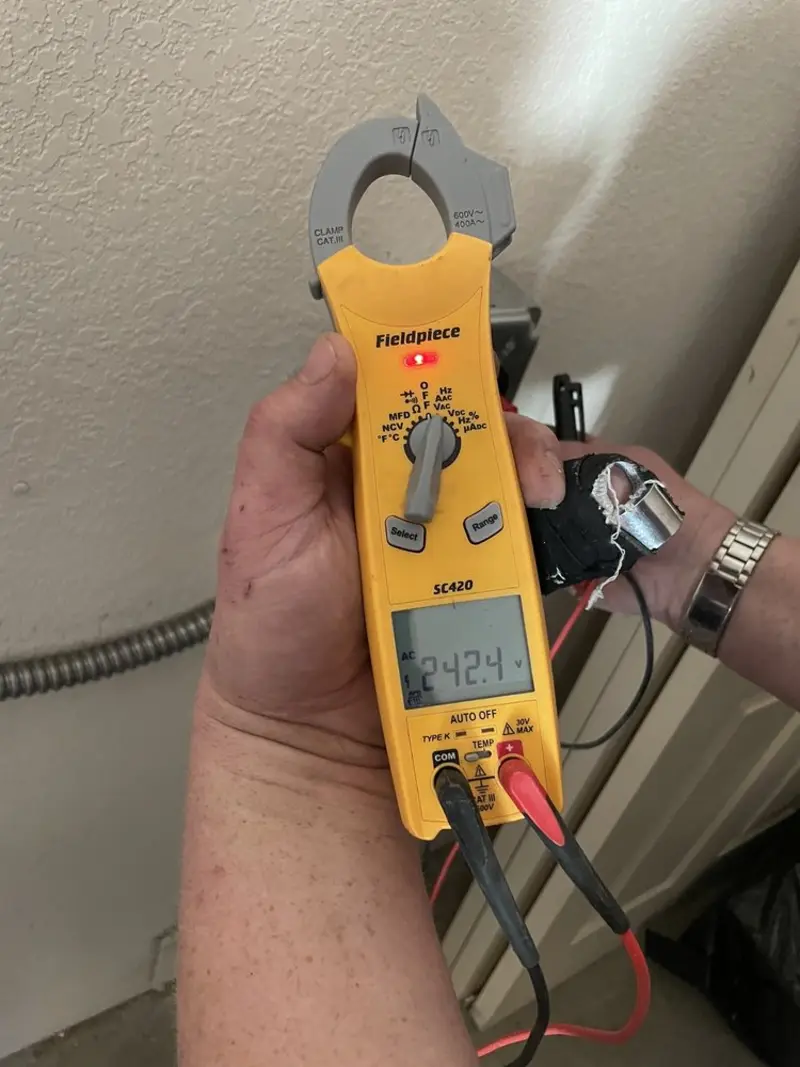 Voltage testing with clamp meter during Circuit Breaker Repair in Wilton